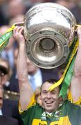 26 September 2004; Kerry's Seamus Moynihan lifts the Sam Maguire Cup. Bank of Ireland All-Ireland Senior Football Championship Final, Kerry v Mayo, Croke Park, Dublin. Picture credit; Damien Eagers / SPORTSFILE *** Local Caption *** Any photograph taken by SPORTSFILE during, or in connection with, the 2004 Bank of Ireland All-Ireland Senior Football Final which displays GAA logos or contains an image or part of an image of any GAA intellectual property, or, which contains images of a GAA player/players in their playing uniforms, may only be used for editorial and non-advertising purposes.  Use of photographs for advertising, as posters or for purchase separately is strictly prohibited unless prior written approval has been obtained from the Gaelic Athletic Association.