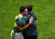 26 September 2004; Jack O'Connor, Kerry manager, congratulates Paul Galvin as he is substituted in the closing minutes of the game. Bank of Ireland All-Ireland Senior Football Championship Final, Kerry v Mayo, Croke Park, Dublin. Picture credit; Pat Murphy / SPORTSFILE *** Local Caption *** Any photograph taken by SPORTSFILE during, or in connection with, the 2004 Bank of Ireland All-Ireland Senior Football Final which displays GAA logos or contains an image or part of an image of any GAA intellectual property, or, which contains images of a GAA player/players in their playing uniforms, may only be used for editorial and non-advertising purposes.  Use of photographs for advertising, as posters or for purchase separately is strictly prohibited unless prior written approval has been obtained from the Gaelic Athletic Association.
