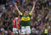 26 September 2004; Ronan O'Connor, Kerry, celebrates victory. Bank of Ireland All-Ireland Senior Football Championship Final, Kerry v Mayo, Croke Park, Dublin. Picture credit; Ray McManus / SPORTSFILE *** Local Caption *** Any photograph taken by SPORTSFILE during, or in connection with, the 2004 Bank of Ireland All-Ireland Senior Football Final which displays GAA logos or contains an image or part of an image of any GAA intellectual property, or, which contains images of a GAA player/players in their playing uniforms, may only be used for editorial and non-advertising purposes.  Use of photographs for advertising, as posters or for purchase separately is strictly prohibited unless prior written approval has been obtained from the Gaelic Athletic Association.