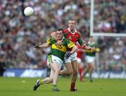 26 September 2004; David Brady, Mayo, in action against William Kirby, Kerry. Bank of Ireland All-Ireland Senior Football Championship Final, Kerry v Mayo, Croke Park, Dublin. Picture credit; Damien Eagers / SPORTSFILE *** Local Caption *** Any photograph taken by SPORTSFILE during, or in connection with, the 2004 Bank of Ireland All-Ireland Senior Football Final which displays GAA logos or contains an image or part of an image of any GAA intellectual property, or, which contains images of a GAA player/players in their playing uniforms, may only be used for editorial and non-advertising purposes.  Use of photographs for advertising, as posters or for purchase separately is strictly prohibited unless prior written approval has been obtained from the Gaelic Athletic Association.