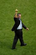 26 September 2004; Golfer Paul McGinley shows off the Ryder Cup to the Croke Park crowd at half time. Bank of Ireland All-Ireland Senior Football Championship Final, Kerry v Mayo, Croke Park, Dublin. Picture credit; Pat Murphy / SPORTSFILE *** Local Caption *** Any photograph taken by SPORTSFILE during, or in connection with, the 2004 Bank of Ireland All-Ireland Senior Football Final which displays GAA logos or contains an image or part of an image of any GAA intellectual property, or, which contains images of a GAA player/players in their playing uniforms, may only be used for editorial and non-advertising purposes.  Use of photographs for advertising, as posters or for purchase separately is strictly prohibited unless prior written approval has been obtained from the Gaelic Athletic Association.