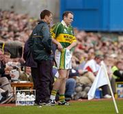 26 September 2004; Kerry's Seamus Moynihan has a word with manager Jack O'Connor before coming on as a substitute. Bank of Ireland All-Ireland Senior Football Championship Final, Kerry v Mayo, Croke Park, Dublin. Picture credit; Brendan Moran / SPORTSFILE *** Local Caption *** Any photograph taken by SPORTSFILE during, or in connection with, the 2004 Bank of Ireland All-Ireland Senior Football Final which displays GAA logos or contains an image or part of an image of any GAA intellectual property, or, which contains images of a GAA player/players in their playing uniforms, may only be used for editorial and non-advertising purposes.  Use of photographs for advertising, as posters or for purchase separately is strictly prohibited unless prior written approval has been obtained from the Gaelic Athletic Association.