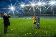 28 September 2013; Martin Collins, left, photographs his son, broadcaster Paul Collins, as he interviews Clare hurler Shane O'Donnell after the game. GAA Hurling All-Ireland Senior Championship Final Replay, Cork v Clare, Croke Park, Dublin. Picture credit: Brendan Moran / SPORTSFILE