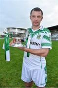 13 October 2013; Moorefield captain Ross Galvin with the cup after the game. Kildare County Senior Club Football Championship Final, Sarsfields v Moorefield, St Conleth's Park, Newbridge, Co. Kildare. Picture credit: Barry Cregg / SPORTSFILE