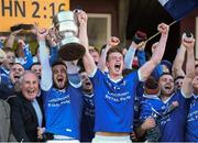 13 October 2013; Paul Sharry, left, and John Heslin, St Lomans, lift the cup after victory over Tyrrellspass. Westmeath County Senior Club Football Championship Final, St Lomans v Tyrrellspass, Cusack Park, Mullingar, Co Westmeath. Picture credit: Ramsey Cardy / SPORTSFILE