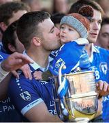 13 October 2013; Paddy Dowdall, St Lomans, celebrates with his son Shea Dowdall after victory over Tyrrellspass. Westmeath County Senior Club Football Championship Final, St Lomans v Tyrrellspass, Cusack Park, Mullingar, Co Westmeath. Picture credit: Ramsey Cardy / SPORTSFILE