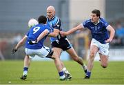 13 October 2013; Martin Flanagan, Tyrrellspass, in action against Willie McGovern, left, and Ciaran Kilmurray, St Lomans. Westmeath County Senior Club Football Championship Final, St Lomans v Tyrrellspass, Cusack Park, Mullingar, Co Westmeath. Picture credit: Ramsey Cardy / SPORTSFILE