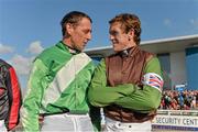 14 October 2013; Jockeys Davy Russell, left, and Tony McCoy in conversation during the Limerick Charity Race Day for the jockeys emergency fund. Limerick Racecourse, Greenmount Park, Co. Limerick. Picture credit: Diarmuid Greene / SPORTSFILE