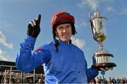 14 October 2013; Jockey Tony McCoy, representing Britain, with the Championship Trophy after victory over Ireland at the Limerick Charity Race Day for the jockeys emergency fund. Limerick Racecourse, Greenmount Park, Co. Limerick. Picture credit: Diarmuid Greene / SPORTSFILE