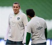 14 October 2013; Republic of Ireland's Richard Dunne and Andy Reid, right, during squad training ahead of their 2014 FIFA World Cup Qualifier, Group C, game against Kazakhstan on Tuesday. Republic of Ireland Squad Training, Aviva Stadium, Lansdowne Road, Dublin. Picture credit: David Maher / SPORTSFILE
