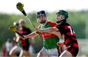 21 June 2025; Daniel Lynch of Ballinora in action against Michael Moloney of Ballygunner during the Hurling Division 1 Final match between Ballygunner and Ballinora during the John West Féile na nGael Camogie and Hurling National Finals at Halo Tiles Wexford GAA Centre of Excellence in Ferns, Wexford. Photo by Shauna Clinton/Sportsfile