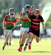 21 June 2025; Charlie Noonan of Ballinora in action against Alfie Ryan of Ballygunner during the Hurling Division 1 Final match between Ballygunner and Ballinora during the John West Féile na nGael Camogie and Hurling National Finals at Halo Tiles Wexford GAA Centre of Excellence in Ferns, Wexford. Photo by Shauna Clinton/Sportsfile