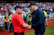 21 June 2025; Dublin manager Dessie Farrell, right, shakes hands with Cork manager John Cleary after the GAA Football All-Ireland Senior Championship preliminary quarter-final match between Dublin and Cork at Croke Park in Dublin. Photo by Ramsey Cardy/Sportsfile