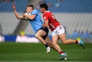 21 June 2025; Tom Lahiff of Dublin in action against Seán Brady  of Cork during the GAA Football All-Ireland Senior Championship preliminary quarter-final match between Dublin and Cork at Croke Park in Dublin. Photo by John Sheridan/Sportsfile