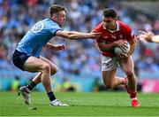 21 June 2025; Seán Powter of Cork in action against Tom Lahiff of Dublin during the GAA Football All-Ireland Senior Championship preliminary quarter-final match between Dublin and Cork at Croke Park in Dublin. Photo by Daire Brennan/Sportsfile