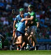 21 June 2025; Riain McBride of Dublin in action against William O'Donoghue of Limerick during the GAA Hurling All-Ireland Senior Championship quarter-final match between Dublin and Limerick at Croke Park in Dublin. Photo by Daire Brennan/Sportsfile