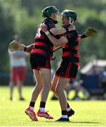 21 June 2025; Michael Moloney of Ballygunner, left, celebrates with team-mate Jack O'Sullivan after their side's victory in the Hurling Division 1 Final match between Ballygunner and Ballinora during the John West Féile na nGael Camogie and Hurling National Finals at Halo Tiles Wexford GAA Centre of Excellence in Ferns, Wexford. Photo by Shauna Clinton/Sportsfile