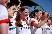 21 June 2025; Young Irelands captain Claire Kavanagh and team-mates after winning the Camogie Division 1 Shield during the John West Féile na nGael Camogie and Hurling National Finals at Halo Tiles Wexford GAA Centre of Excellence in Ferns, Wexford. Photo by Shauna Clinton/Sportsfile