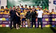 21 June 2025; Sixmilebridge captain Liam Flannery and team-mates after winning the Hurling Division 1 Shield during the John West Féile na nGael Camogie and Hurling National Finals at Halo Tiles Wexford GAA Centre of Excellence in Ferns, Wexford. Photo by Shauna Clinton/Sportsfile