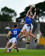 21 June 2025; Evan Crowe of Cavan in action against Seán O'Brien of Kerry during the GAA Football All-Ireland Senior Championship preliminary quarter-final match between Kerry and Cavan at Fitzgerald Stadium in Killarney, Kerry. Photo by Brendan Moran/Sportsfile