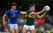 21 June 2025; Graham O'Sullivan of Kerry in action against Oisin Kiernan of Cavan during the GAA Football All-Ireland Senior Championship preliminary quarter-final match between Kerry and Cavan at Fitzgerald Stadium in Killarney, Kerry. Photo by Brendan Moran/Sportsfile