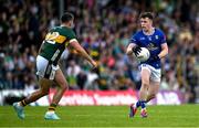 21 June 2025; Dara McVeety of Cavan in action against Graham O'Sullivan of Kerry during the GAA Football All-Ireland Senior Championship preliminary quarter-final match between Kerry and Cavan at Fitzgerald Stadium in Killarney, Kerry. Photo by Brendan Moran/Sportsfile