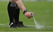 21 June 2025; Referee Jerome Henry sprays vanishing foam to mark the spot for a free kick during the GAA Football All-Ireland Senior Championship preliminary quarter-final match between Kerry and Cavan at Fitzgerald Stadium in Killarney, Kerry. Photo by Brendan Moran/Sportsfile