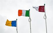 21 June 2025; The Tricolour flutters in the wind with the Tipperary flag, left, and Galway, right, during the GAA Hurling All-Ireland Senior Championship quarter-final match between Galway and Tipperary at TUS Gaelic Grounds in Limerick. Photo by Ray McManus/Sportsfile