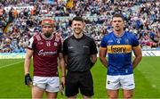 21 June 2025; Referee Sean Stack with the two captains, Conor Whelan of Galway and Ronan Maher of Tipperary, before the GAA Hurling All-Ireland Senior Championship quarter-final match between Galway and Tipperary at TUS Gaelic Grounds in Limerick. Photo by Ray McManus/Sportsfile