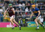 21 June 2025; Cianan Fahy of Galway in action against Jake Morris of Tipperary during the GAA Hurling All-Ireland Senior Championship quarter-final match between Galway and Tipperary at TUS Gaelic Grounds in Limerick. Photo by Ray McManus/Sportsfile