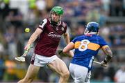 21 June 2025; Cianan Fahy of Galway in action against Willie Connors of Tipperary during the GAA Hurling All-Ireland Senior Championship quarter-final match between Galway and Tipperary at TUS Gaelic Grounds in Limerick. Photo by Ray McManus/Sportsfile