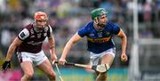 21 June 2025; Sam O’Farrell of Tipperary in action against Conor Whelan of Galway during the GAA Hurling All-Ireland Senior Championship quarter-final match between Galway and Tipperary at TUS Gaelic Grounds in Limerick. Photo by Ray McManus/Sportsfile