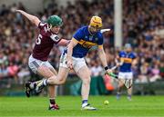 21 June 2025; Jake Morris of Tipperary is tackled by Gavin Lee of Galway during the GAA Hurling All-Ireland Senior Championship quarter-final match between Galway and Tipperary at TUS Gaelic Grounds in Limerick. Photo by Ray McManus/Sportsfile