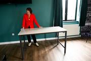 22 June 2025; Down chairperson Maureen O'Higgins cleans the tables in the boardroom in preperation for the GAA Football All-Ireland Senior Championship preliminary quarter-final match between Down and Galway at Páirc Esler in Newry, Down. Photo by Ben McShane/Sportsfile