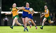 21 June 2025; Aishling Moloney of Tipperary in action against Evelyn McGinley of Donegal during the TG4 All-Ireland Ladies Football Senior Championship Group 1 match between Tipperary and Donegal at Canon Hayes Park in Bansha, Tipperary. Photo by Seb Daly/Sportsfile