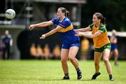 21 June 2025; Lucy Spillane of Tipperary in action against Katie Dowds of Donegal during the TG4 All-Ireland Ladies Football Senior Championship Group 1 match between Tipperary and Donegal at Canon Hayes Park in Bansha, Tipperary. Photo by Seb Daly/Sportsfile