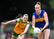 21 June 2025; Aishling Moloney of Tipperary in action against Roisin Rodgers of Donegal during the TG4 All-Ireland Ladies Football Senior Championship Group 1 match between Tipperary and Donegal at Canon Hayes Park in Bansha, Tipperary. Photo by Seb Daly/Sportsfile