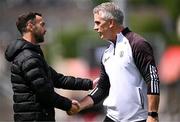 22 June 2025; Down manager Conor Laverty, left, and Galway manager Padraic Joyce shake hands before the GAA Football All-Ireland Senior Championship preliminary quarter-final match between Down and Galway at Páirc Esler in Newry, Down. Photo by Ben McShane/Sportsfile