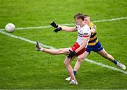 22 June 2025; Peter Coltan of Tyrone in action against Tadgh Rogers of Roscommon during the Electric Ireland GAA Football All-Ireland Minor Championship semi-final match between Tyrone and Roscommon at Kingspan Breffni in Cavan. Photo by Seb Daly/Sportsfile