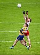 22 June 2025; Cathal Farley of Tyrone in action against Christopher Feerick of Roscommon during the Electric Ireland GAA Football All-Ireland Minor Championship semi-final match between Tyrone and Roscommon at Kingspan Breffni in Cavan. Photo by Seb Daly/Sportsfile