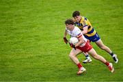 22 June 2025; Joel Kerr of Tyrone in action against Conor Tighe of Roscommon during the Electric Ireland GAA Football All-Ireland Minor Championship semi-final match between Tyrone and Roscommon at Kingspan Breffni in Cavan. Photo by Seb Daly/Sportsfile
