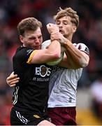 22 June 2025; Ryan Magill of Down is tackled by Cian Hernon of Galway during the GAA Football All-Ireland Senior Championship preliminary quarter-final match between Down and Galway at Páirc Esler in Newry, Down. Photo by Ben McShane/Sportsfile