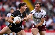 22 June 2025; Pierce Laverty of Down is tackled by John Maher of Galway during the GAA Football All-Ireland Senior Championship preliminary quarter-final match between Down and Galway at Páirc Esler in Newry, Down. Photo by Ben McShane/Sportsfile