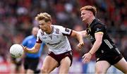 22 June 2025; Cian Hernon of Galway in action against Danny Magill of Down during the GAA Football All-Ireland Senior Championship preliminary quarter-final match between Down and Galway at Páirc Esler in Newry, Down. Photo by Ben McShane/Sportsfile