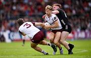 22 June 2025; Cian Hernon, centre, and Seán Fitzgerald of Galway in action against Danny Magill of Down during the GAA Football All-Ireland Senior Championship preliminary quarter-final match between Down and Galway at Páirc Esler in Newry, Down. Photo by Ben McShane/Sportsfile