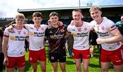 22 June 2025; Tyrone players, from left, Peter Coltan, Aodhan Quinn, goalkeeper Ronan Donnelly, Darren McAnespie and Pádraig Goodman after their side's victory in the Electric Ireland GAA Football All-Ireland Minor Championship semi-final match between Tyrone and Roscommon at Kingspan Breffni in Cavan. Photo by Seb Daly/Sportsfile