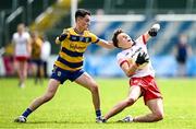 22 June 2025; Aodhan Quinn of Tyrone is fouled by Dara Curran of Roscommon during the Electric Ireland GAA Football All-Ireland Minor Championship semi-final match between Tyrone and Roscommon at Kingspan Breffni in Cavan. Photo by Seb Daly/Sportsfile
