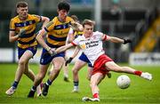 22 June 2025; Elliott Kerr of Tyrone in action against Sam Hannon of Roscommon during the Electric Ireland GAA Football All-Ireland Minor Championship semi-final match between Tyrone and Roscommon at Kingspan Breffni in Cavan. Photo by Seb Daly/Sportsfile