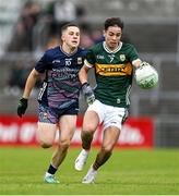 22 June 2025; Marcus Clifford of Kerry in action against Rhys Neary of Mayo during the Electric Ireland GAA Football All-Ireland Minor Championship semi-final match between Kerry and Mayo at Zimmer Biomet Páirc Chíosóg in Ennis, Clare. Photo by Brendan Moran/Sportsfile