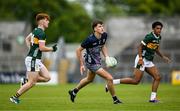 22 June 2025; Adam Kelly of Mayo in action against Kevin Griffin, left, and Alex Tuohy of Kerry during the Electric Ireland GAA Football All-Ireland Minor Championship semi-final match between Kerry and Mayo at Zimmer Biomet Páirc Chíosóg in Ennis, Clare. Photo by Brendan Moran/Sportsfile